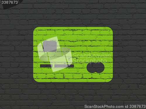 Image of Currency concept: Credit Card on wall background