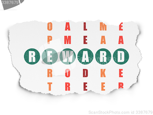 Image of Business concept: word Reward in solving Crossword Puzzle