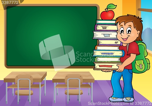 Image of Boy holding books theme image 4
