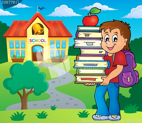 Image of Boy holding books theme image 2