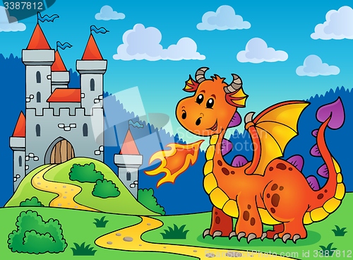 Image of Happy orange dragon near castle