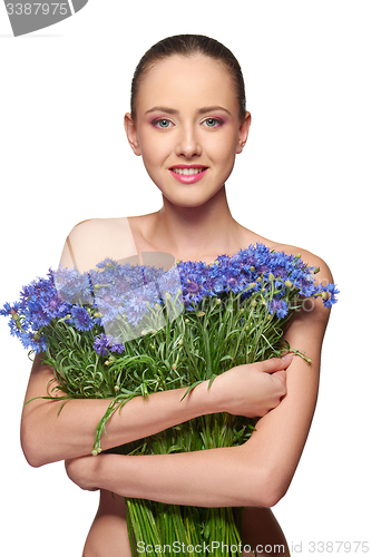 Image of Beautiful girl with pink peony flowers