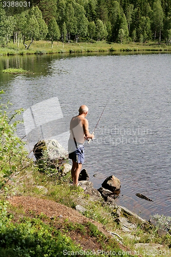Image of Senior fishing