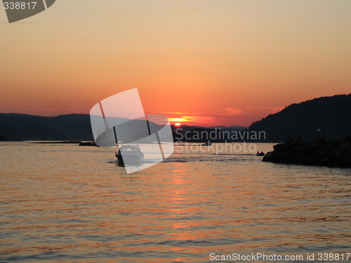 Image of Boats in sunset