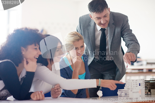 Image of group of students with teacher on class