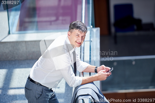 Image of business man using phone