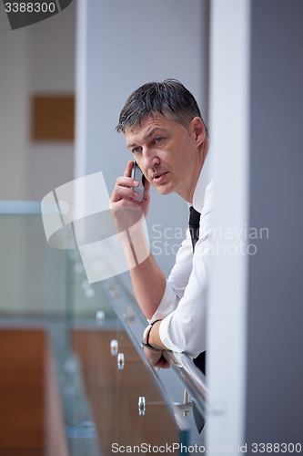 Image of business man using phone