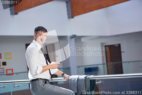 Image of business man using phone