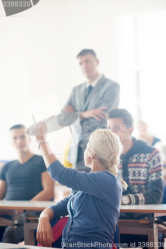 Image of group of students with teacher on class