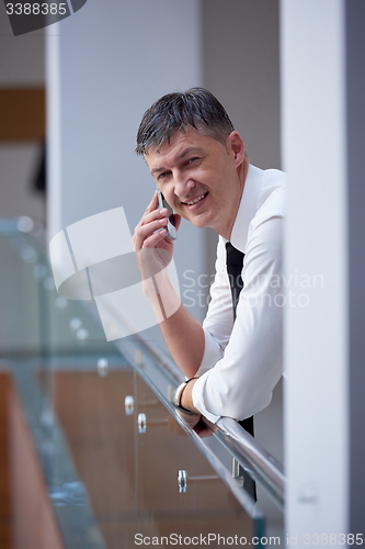 Image of business man using phone