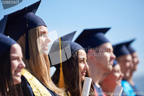 Image of young graduates students group