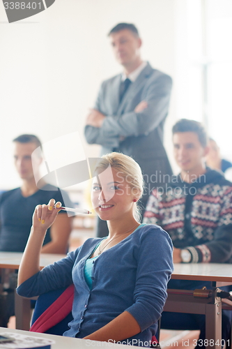 Image of group of students with teacher on class