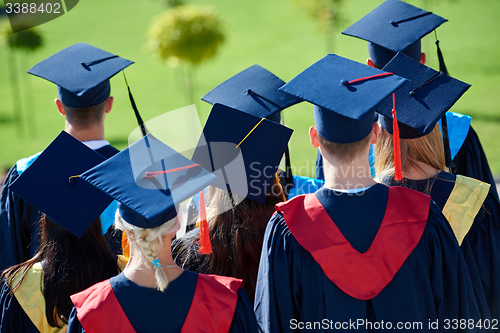 Image of young graduates students group