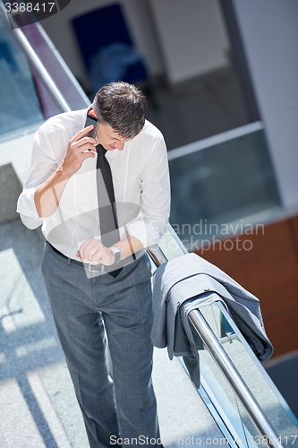 Image of business man using phone