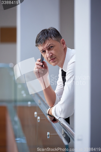 Image of business man using phone