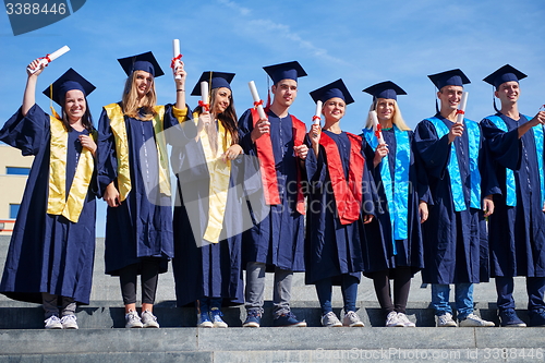 Image of young graduates students group