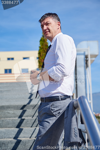 Image of businness man portrait outdoors