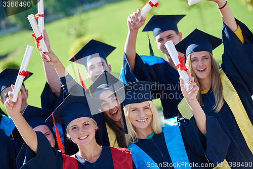 Image of young graduates students group