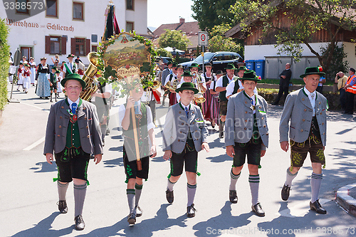 Image of Hausham / Germany / Bavaria-09th August: costumes club Miesbach with chapel