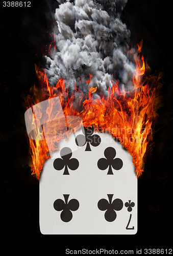 Image of Playing card with fire and smoke