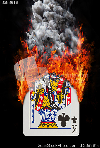 Image of Playing card with fire and smoke