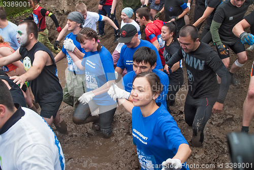 Image of Teams in dirty cross-country race stage. Tyumen