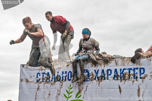 Image of Sportsmen jumps in water. Steel Character. Tyumen