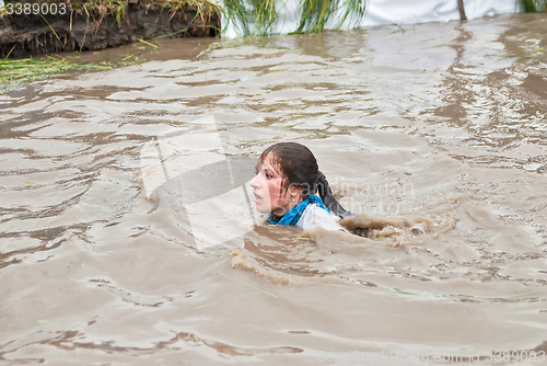 Image of Woman swims in race. Steel Character. Tyumen