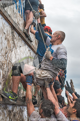 Image of Team storms big wall in extrim race. Tyumen.Russia