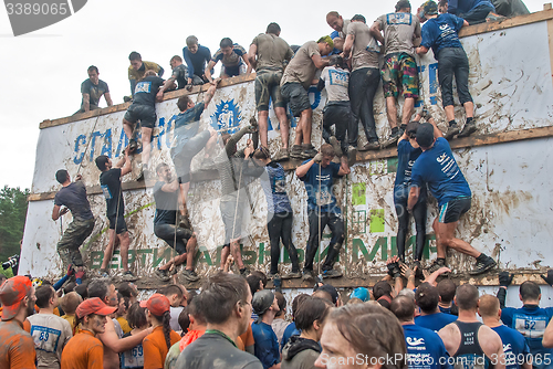 Image of Team storms big wall in extrim race. Bastion stage