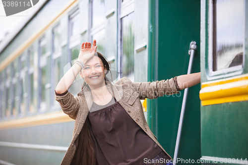 Image of beautiful woman returned from a trip