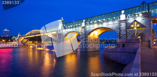 Image of night landscape with covered bridge