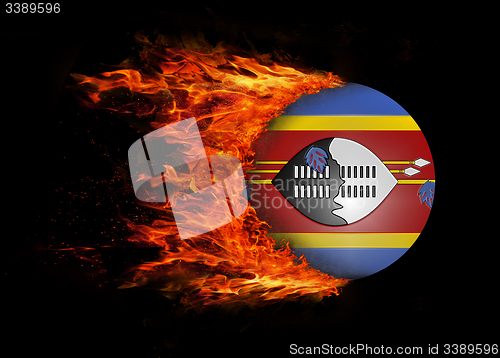 Image of Flag with a trail of fire - Swaziland