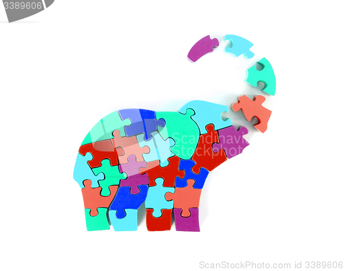 Image of Colorful puzzle pieces in elephant shape