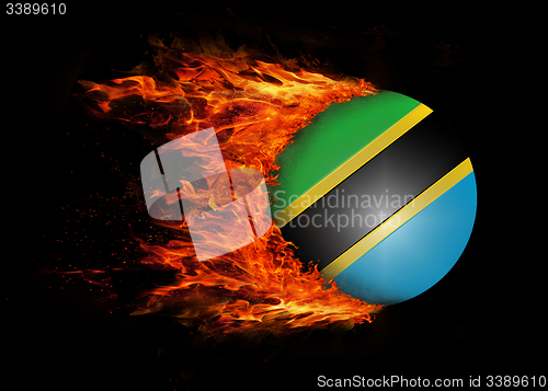 Image of Flag with a trail of fire - Tanzania