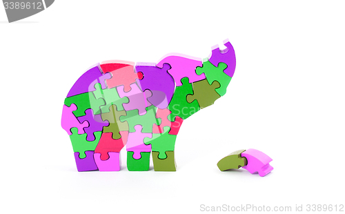 Image of Colorful puzzle pieces in elephant shape