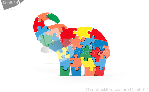 Image of Colorful puzzle pieces in elephant shape