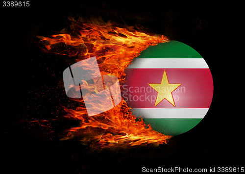 Image of Flag with a trail of fire - Suriname