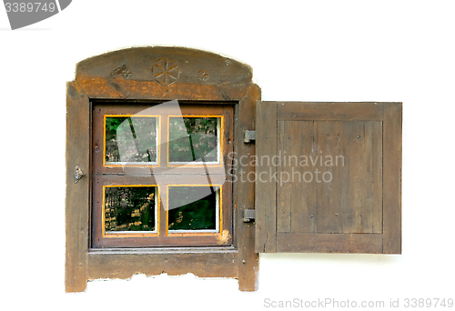 Image of Old wooden window on a white wall.