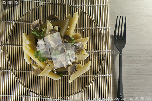 Image of Mushroon sauce pasta on a plate