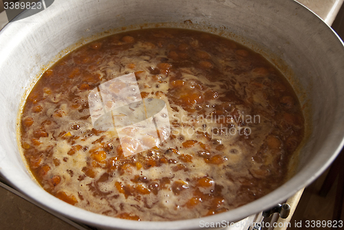 Image of bowl with preparing apricot jam