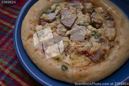 Image of closeup of meat pizza
