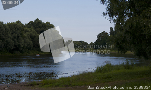 Image of river in summer with boaters