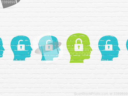 Image of Safety concept: head with padlock icon on wall background