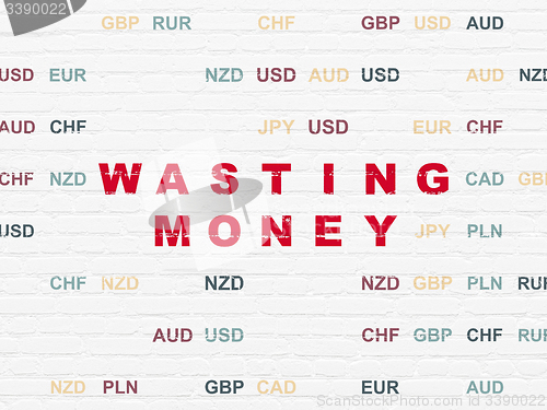 Image of Banking concept: Wasting Money on wall background