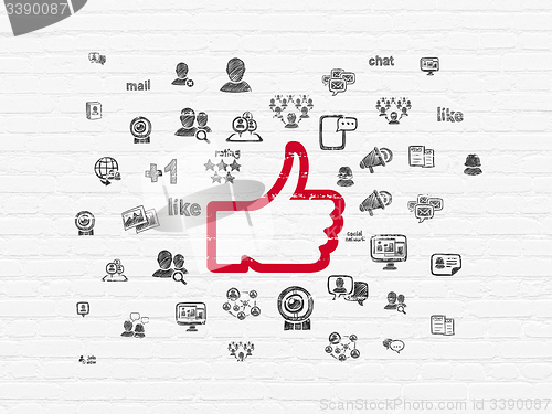 Image of Social network concept: Thumb Up on wall background