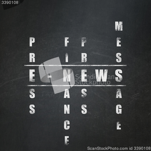 Image of News concept: word E-news in solving Crossword Puzzle
