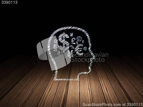 Image of Advertising concept: Head With Finance Symbol in grunge dark room