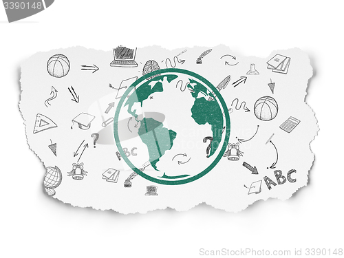 Image of Learning concept: Globe on Torn Paper background