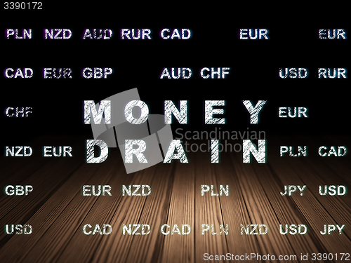 Image of Currency concept: Money Drain in grunge dark room